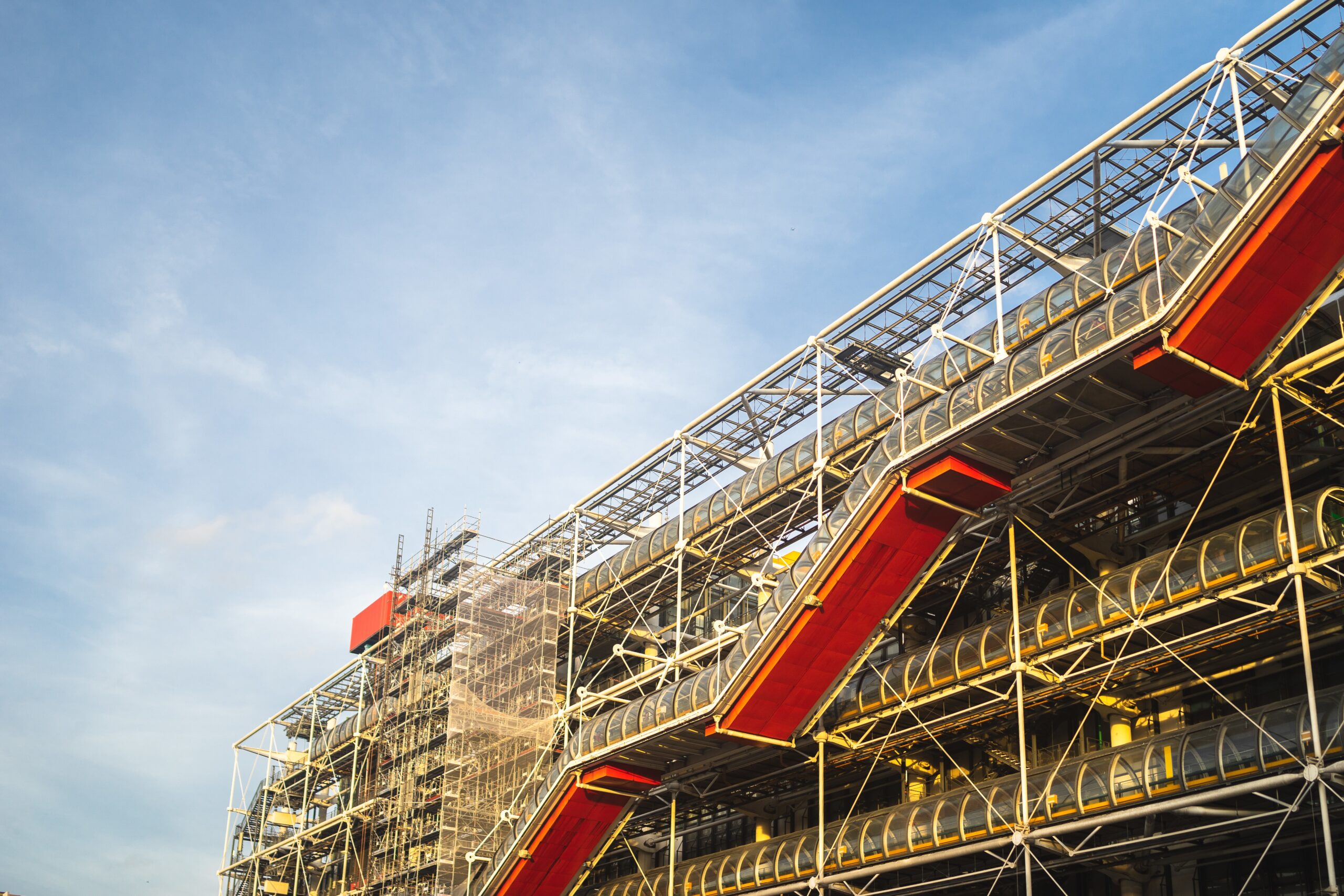 The Centre Pompidou under a blue sky and sunlight during daytime in Paris in France
