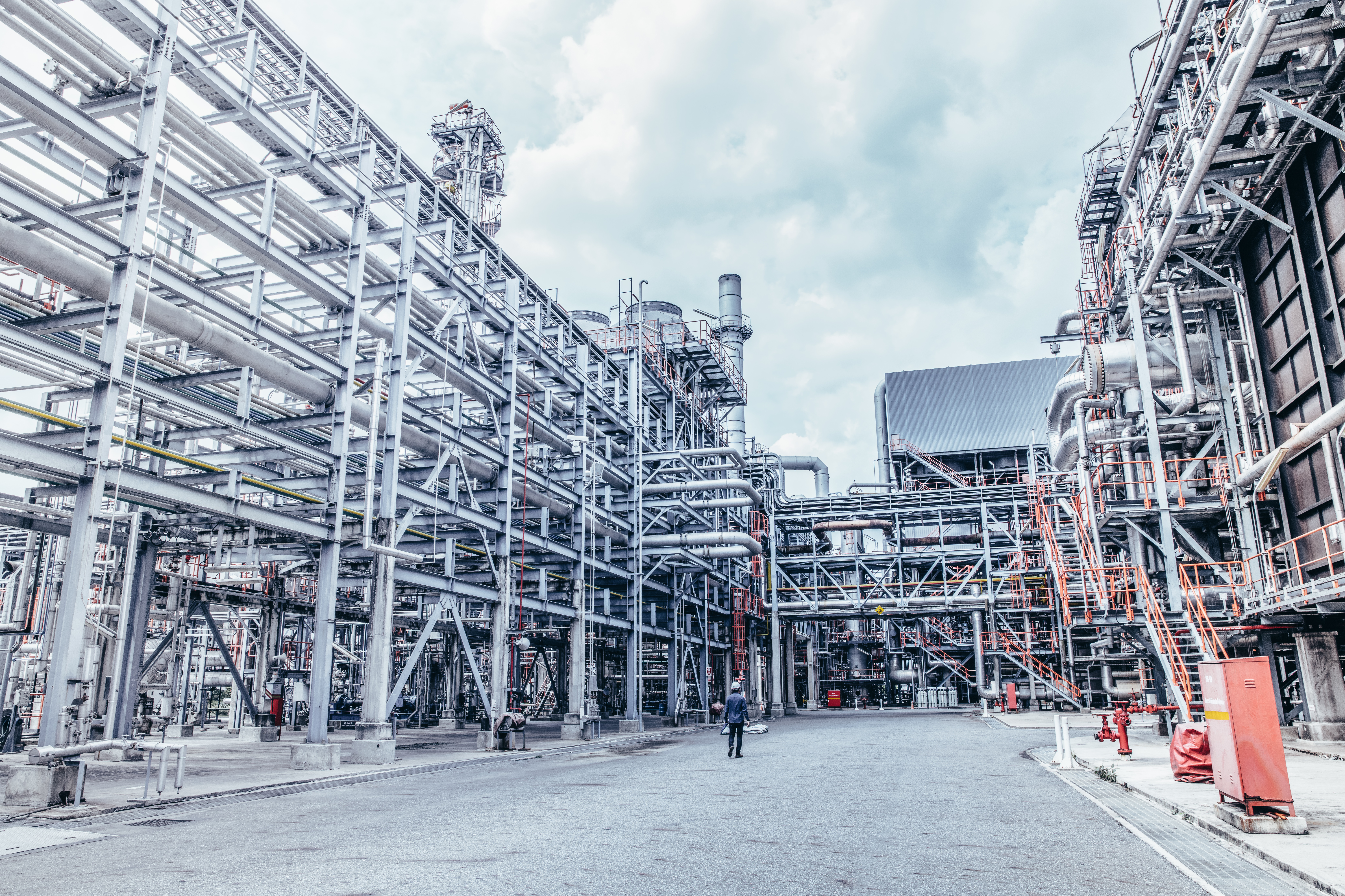 Industrial zone,The equipment of oil refining,Close-up of industrial pipelines of an oil-refinery plant,Detail of oil pipeline with valves in large oil refinery.