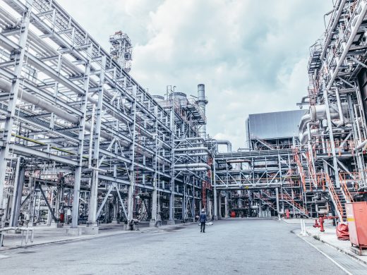 Industrial zone,The equipment of oil refining,Close-up of industrial pipelines of an oil-refinery plant,Detail of oil pipeline with valves in large oil refinery.